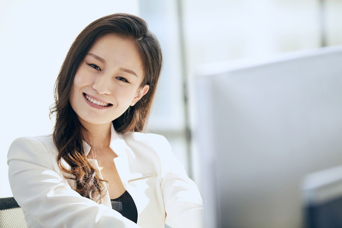 Smile makeover Sector 14 Kharghar — confident smiling woman, cosmetic dentistry at Dr. Pithadia's Clinic